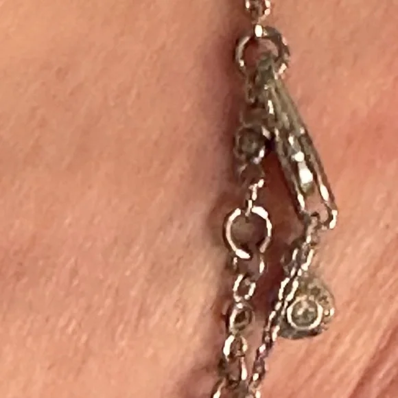 Gorgeous HENRI BENDEL Sparkly Rhinestone, Silver Infinity Bracelet - Picture 9 of 11